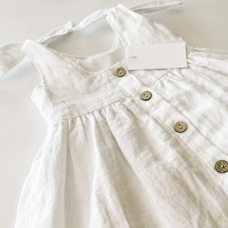 Vestido de lino con tapeta de botones