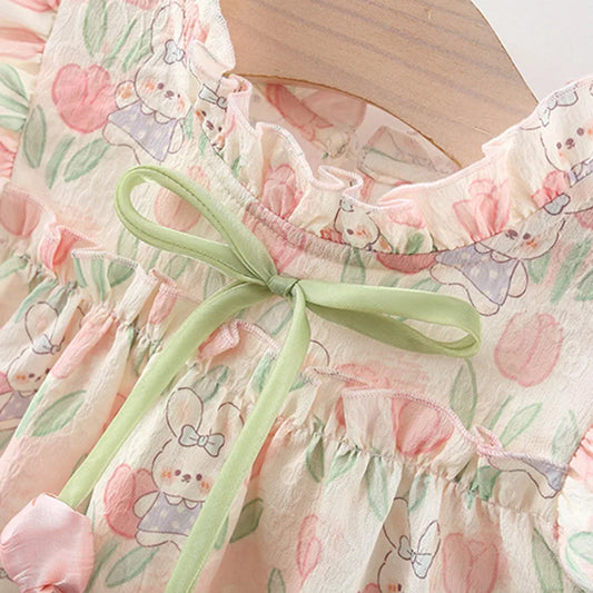 Enchanting summer dress with tulips and bunny motif