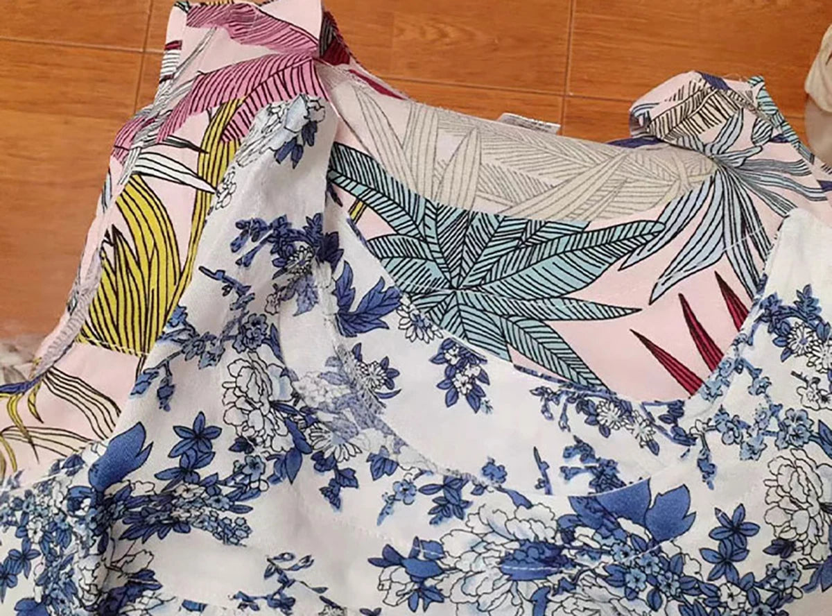 Vestido de verano para mujer con estampado de cuadros: sin mangas, largo hasta la rodilla, con bolsillos, elegante e informal.