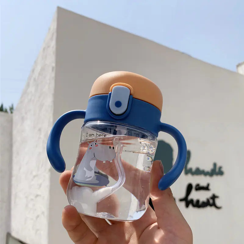 Vaso de aprendizaje con pajita y asas