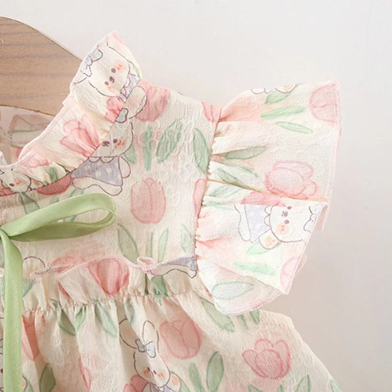 Encantador vestido de verano con tulipanes y motivo de conejito.