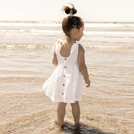 Vestido de lino con tapeta de botones