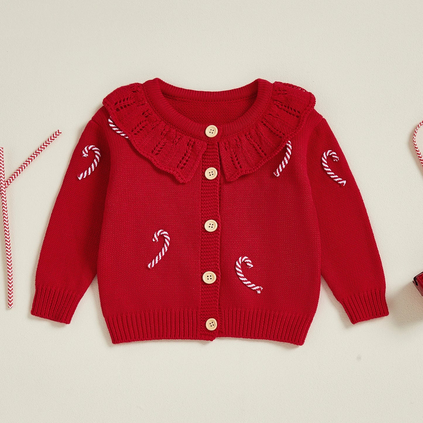 Weihnachtliche Strickjacke mit Zuckerstangen Zauber