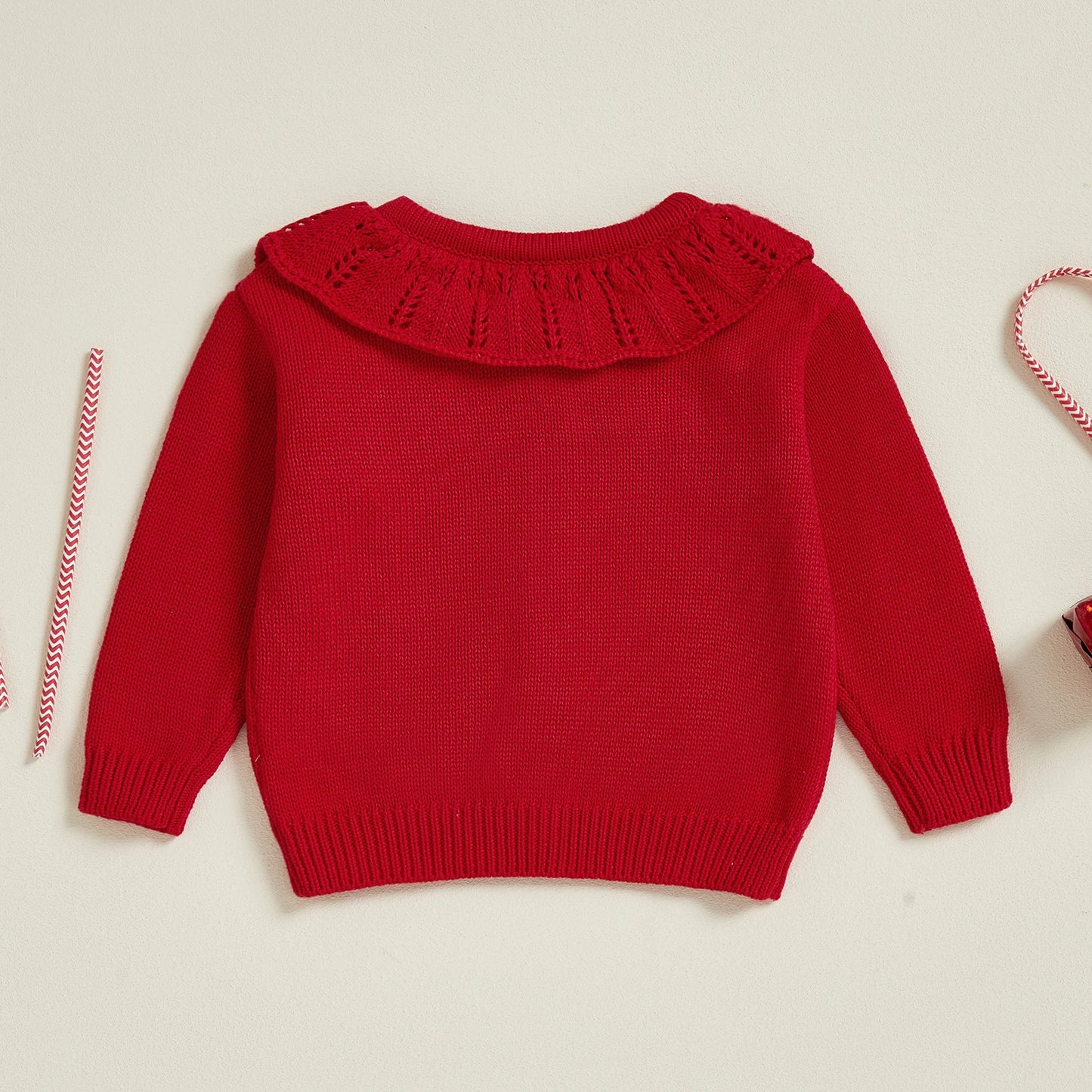 Weihnachtliche Strickjacke mit Zuckerstangen Zauber